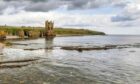 Keiss Castle in Caithness is being offered for sale by Strutt and Parker. Pictured is the castle ruin over Sinclair Bay.