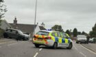 Crashed Mini and a police car on North Deeside Road