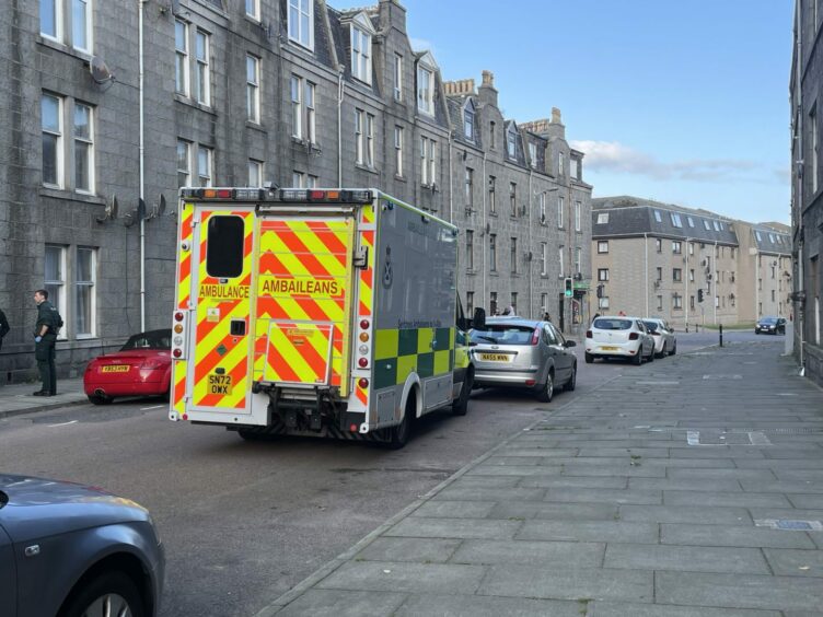 Ambulance at the scene of the disturbance at on Urquhart Road, close to the junction with Roslin Road in Aberdeen.