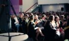 NESCol students waiting to graduate at a previous ceremony. Image: NESCol