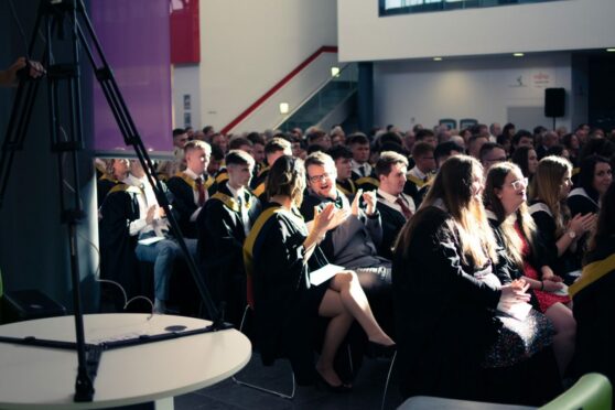 NESCol students waiting to graduate at a previous ceremony. Image: NESCol