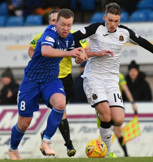 Joe McKee in action against Peterhead during his time with Dumbarton.