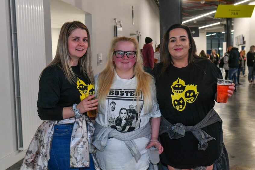 Three girls decked out in Busted uk tour T-shirts at Aberdeen's P&J Live