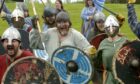 Members of 'Glasgow Vikings' reenact a scene from a 9th century battle at Archaeolink prehistory park's Invasion Event back in 2006