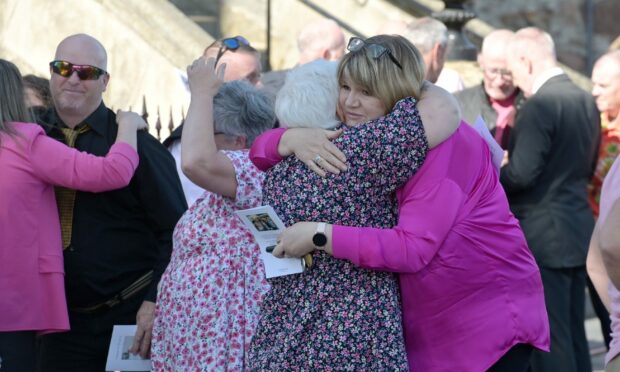 Mourners were asked to wear pink and bright colours to the funeral. Image Sandy McCook/DC Thomson