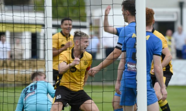 Nairn County captain Fraser Dingwall, centre, celebrates scoring against Strathspey Thistle. Pictures by Sandy McCook/DC Thomson