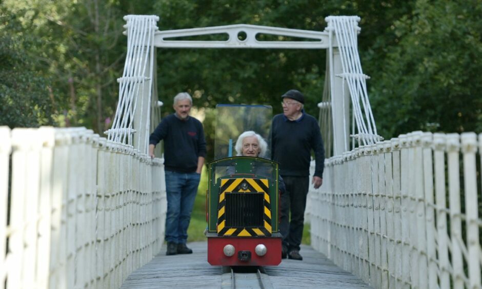 Ness Islands Miniature Railway celebrates 40 years this year, cared for by veteran volunteers including (left to right) Jim Blyth, Alasdair Macleod and Brian Warrender. Image: Sandy McCook/DC Thomson