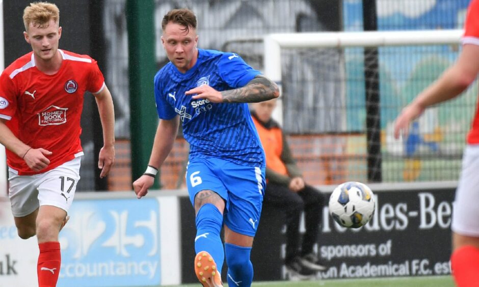 Peterhead player/co-manager Ryan Strachan in action in a League Two match.