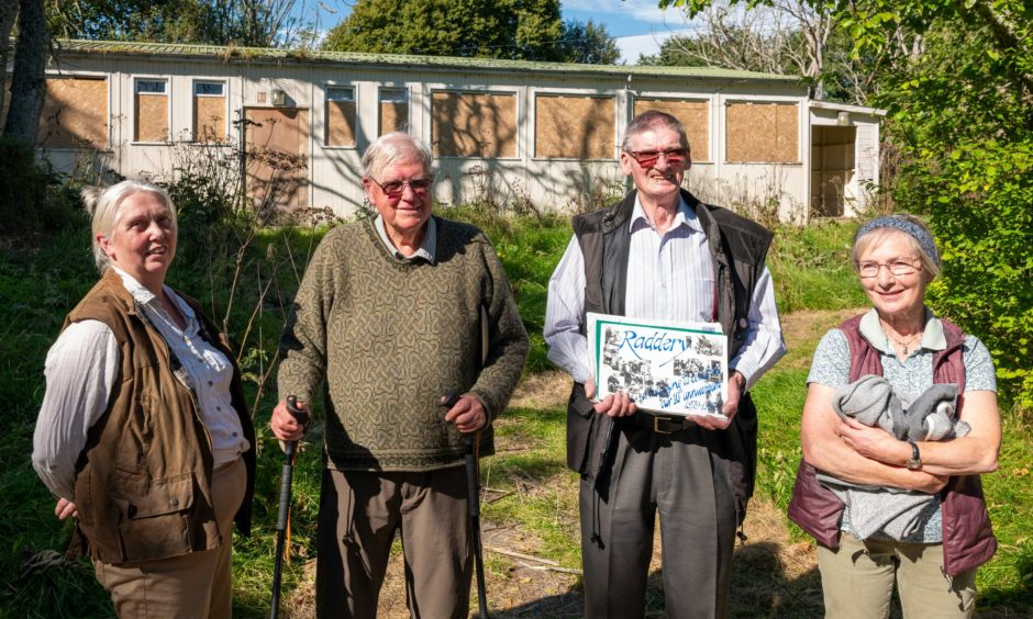 Bev Smith, David Dean, former school driver Stewart Hiddleston and Valery Dean at the site last year. 