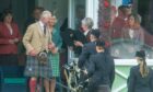King Charles and Queen Camilla with members of Gordonstoun School Pipe Band.