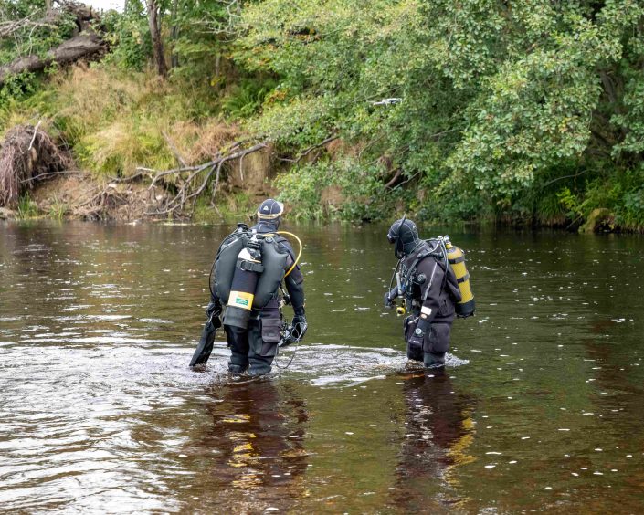 Two divers in the River Don