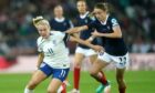 Scotland's Christy Grimshaw battles with England's Lauren Hemp in the Nations League match.