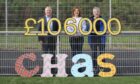 Ron Cruickshank and Graham Cross from the Sceckie Soccer Fives and Ruathy Donald from CHAS. Inverness mark the landmark fundraising effort.
