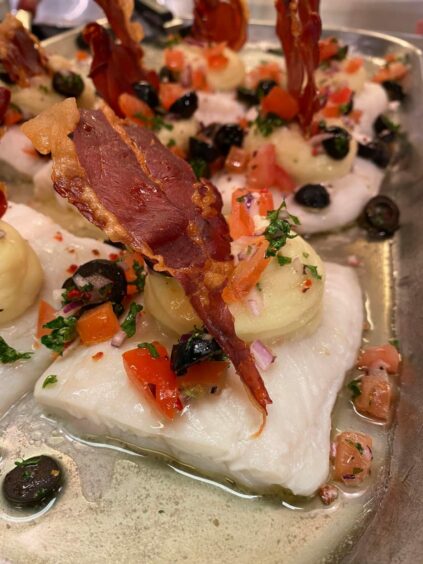 Baked cod with sweet potato puree, chorizo salsa and bacon. 