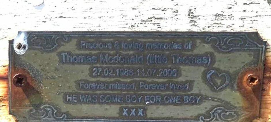 "He was some boy for one boy" reads the plaque placed to remember Thomas McDonald on the memorial bench in Torry. 
