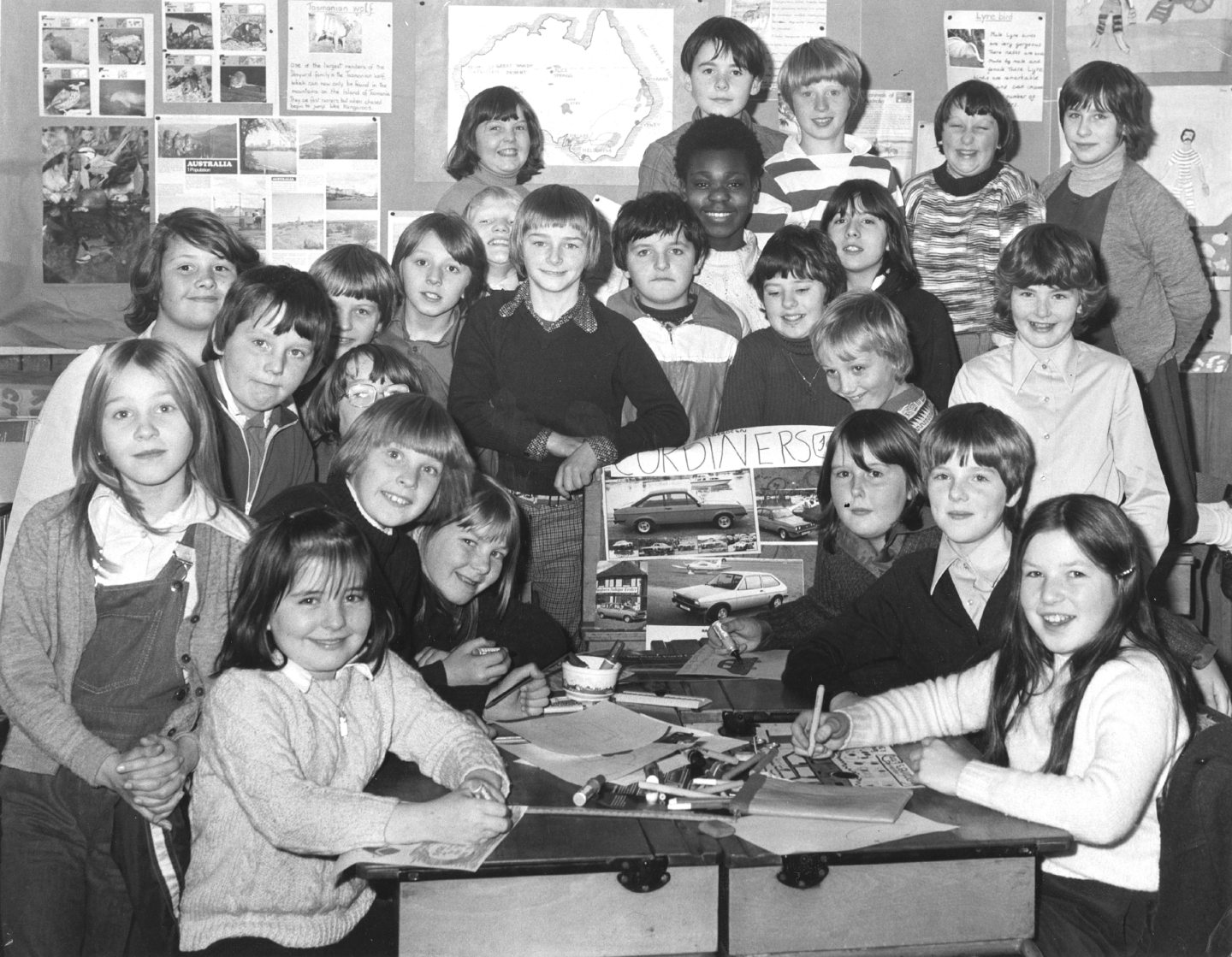 P7 children designing advertisements at the Aberdeen school in 1979.