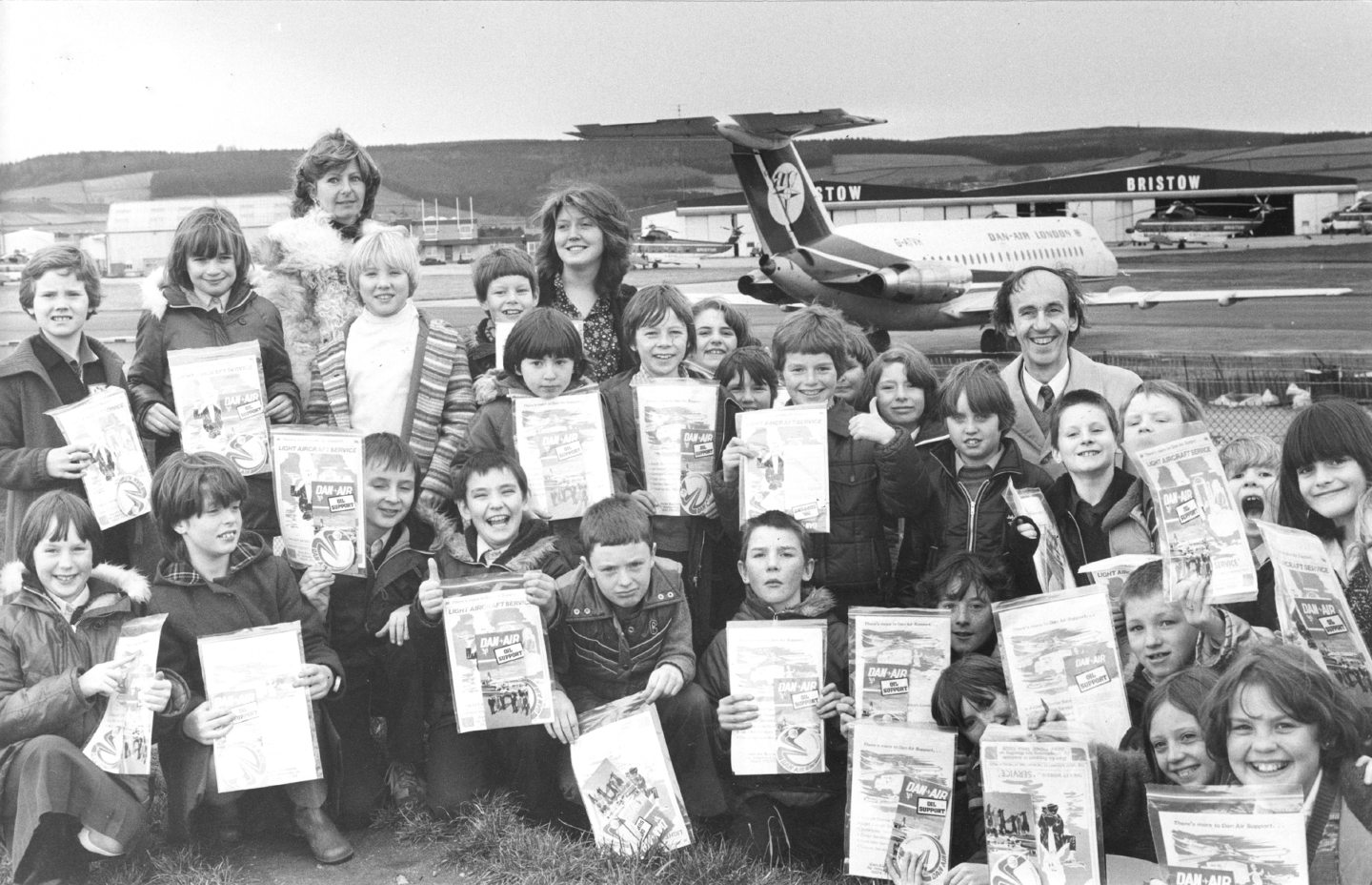 Pupils proudly display their souvenirs following their visit to Aberdeen Airport, Dyce in 1980.
