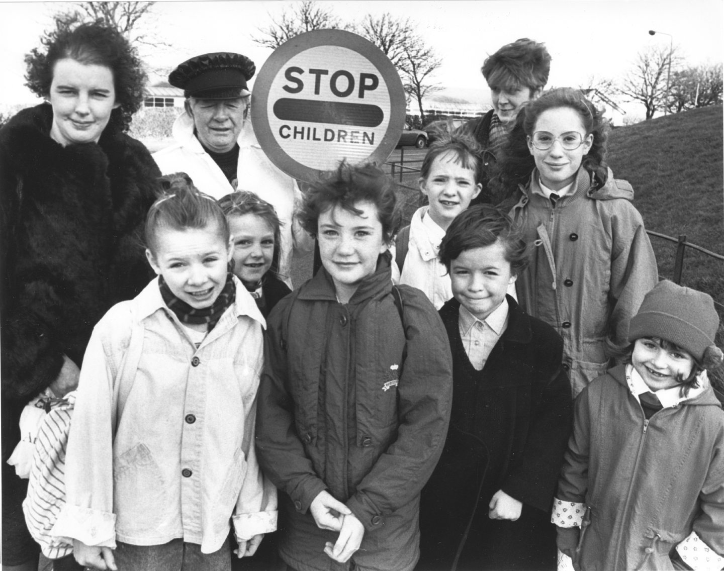 Lollipop man, 67-year-old George Dundas, helps the pupils across the junction at Grampian Place and Oscar Road on their way to Torry Academy in 1990. 