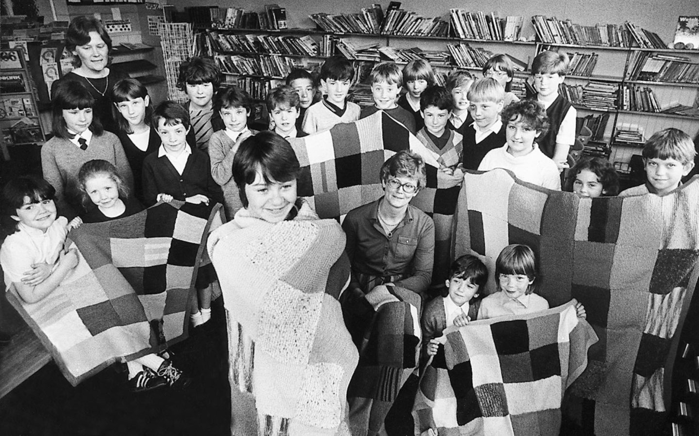 Talented pupils from the Aberdeen school with the blankets and vests they knitted for Save The Children in 1985.
