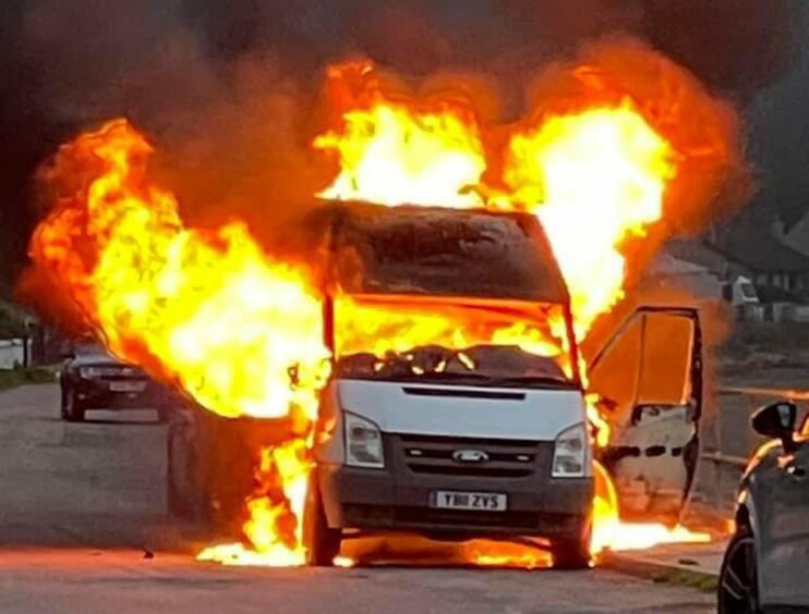 The van quickly burst into a raging fire on the seafront at Cromarty. 