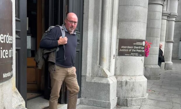 Alasdair Imrie leaves Aberdeen Sheriff Court. Image: DC Thomson