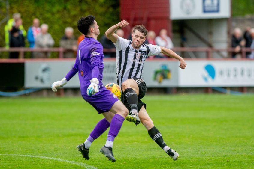Ryan Sargent, right, of Fraserburgh is thwarted by Brechin goalkeeper Lenny Wilson