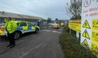 Police at the scene of the incident at GPH Builders Merchants in Stonehaven. Image: DC Thomson