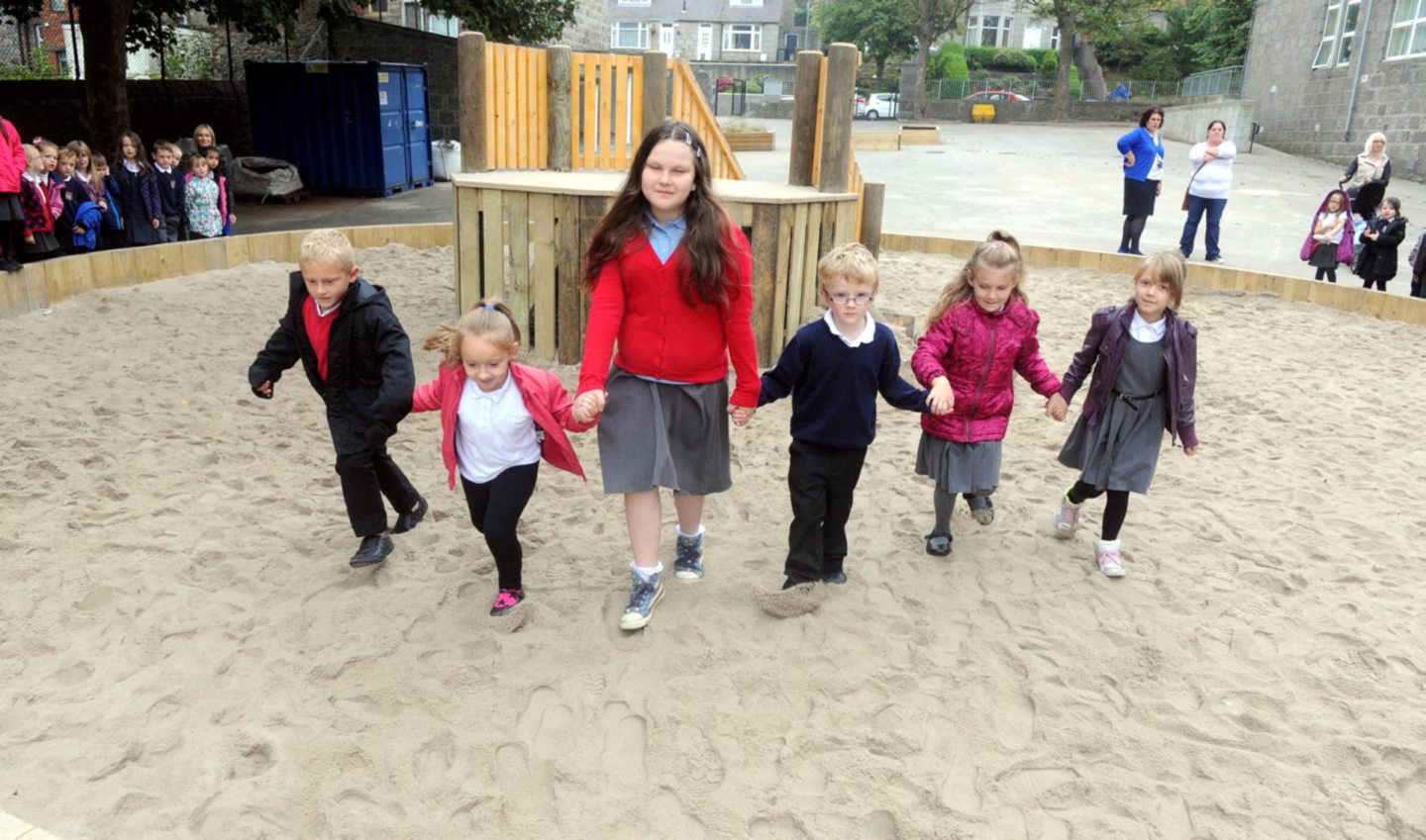 Pupils at the newly-opened playground at Walker Road School in Torry in 2014.