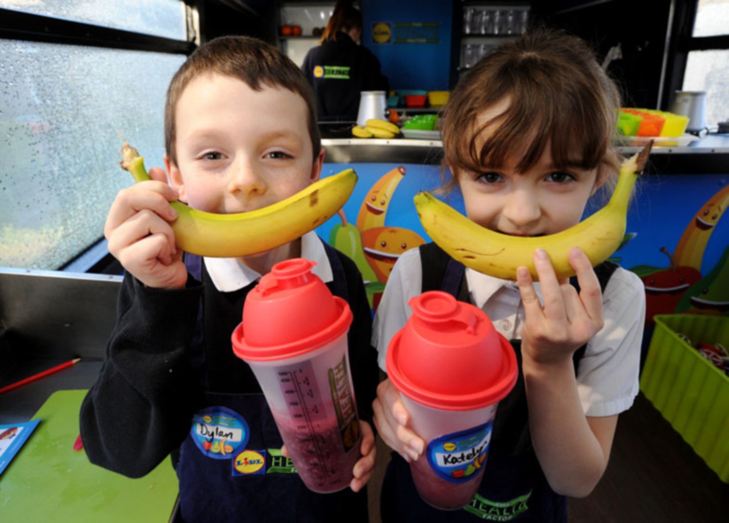 Dylan Jardine and Katelyn Leiper pose with smoothies they made when the Lidl health factor visited in 2014.
