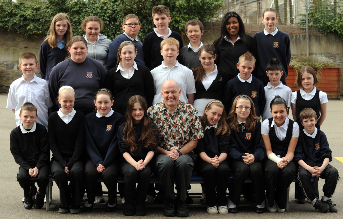  Teacher David Gibson with his class of P7 leavers in 2009.