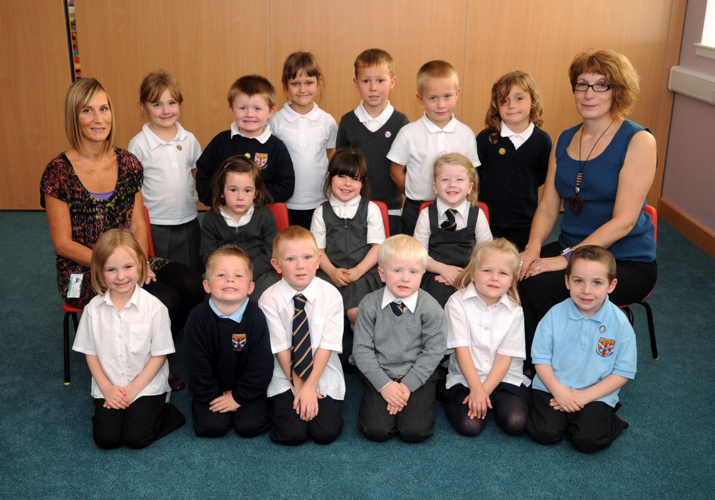Teacher Gillian Penman and assistant Fiona Brown with their new P1 class in 2009.