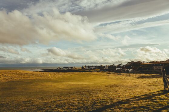 The golf course on the North Sea coast in Brora village in Highlands of Scotland, UK; Shutterstock ID 1681423705; purchase_order: ; job: