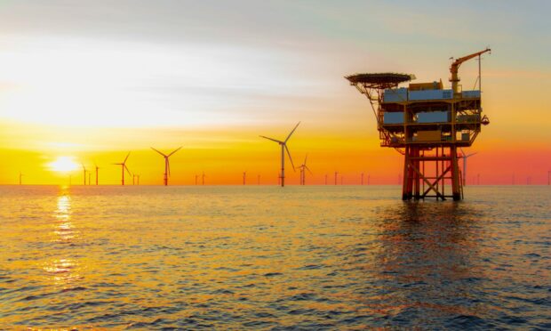 Beautiful sunset in the North Sea offshore wind farm.