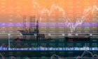 Stock market concept with oil rig background.