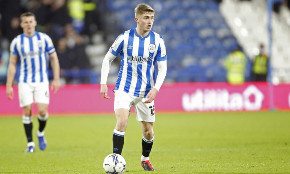 Scott High in action for Huddersfield Town against Stoke City.