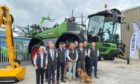 The new team at Ross Agri's Muir of Ord depot with the firm's management team.
