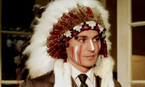 Johnny Depp in Finding Neverland, wearing Native American clothing.