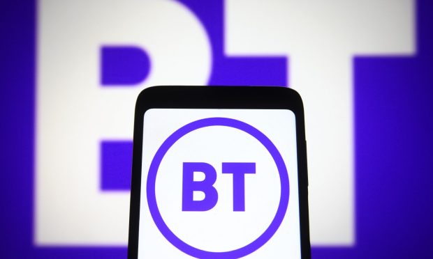 Mobile phone with BT logo infront of BT logo