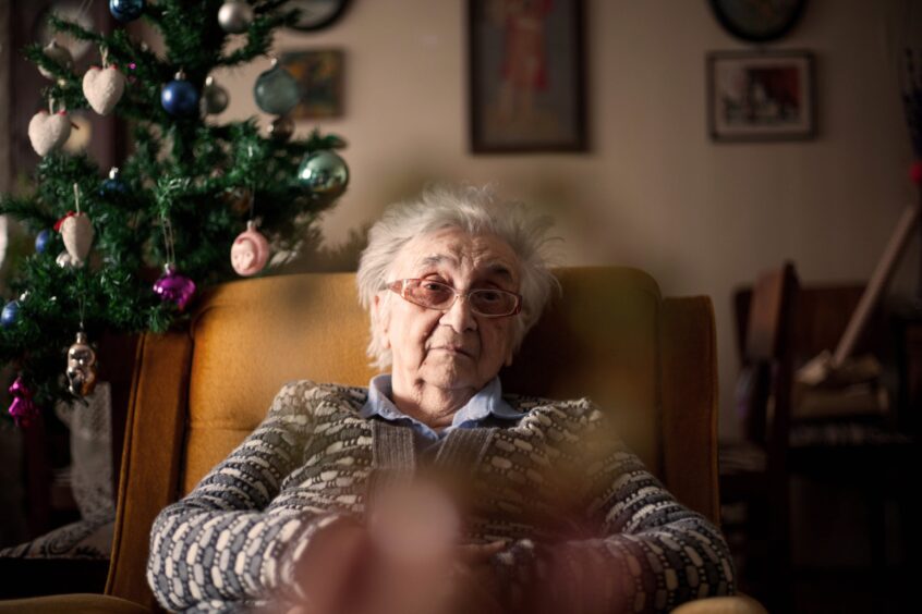 Senior grandmother depressed and alone on Christmas