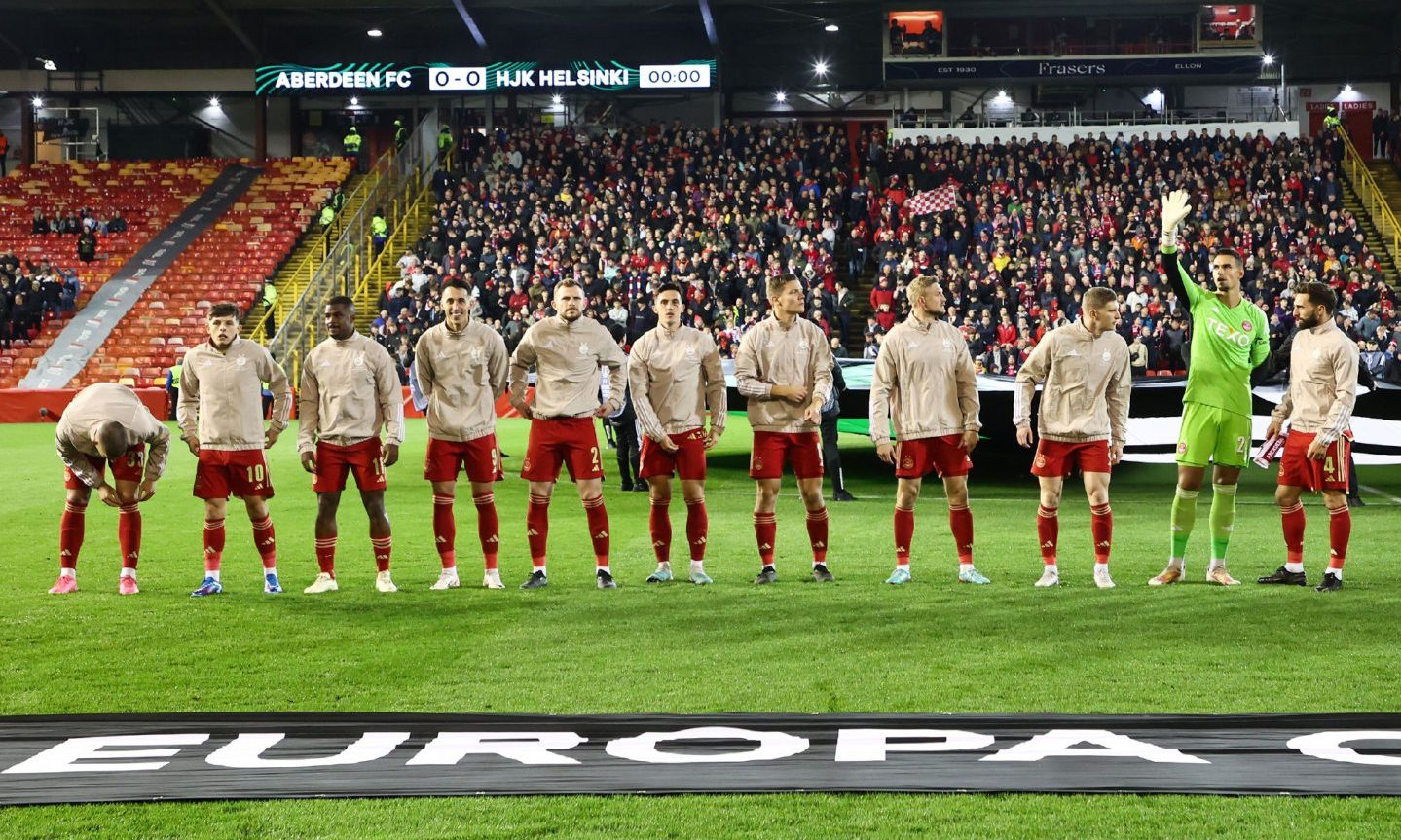 Aberdeen players lined up on the pitch before the match