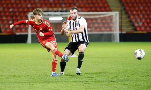 Aberdeen's Dylan Lobban, left, in action against Fraserburgh in the Aberdeenshire Shield earlier this season. Image: Shutterstock.