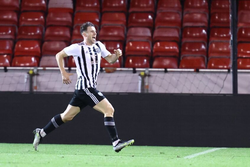 Ryan Sargent celebrates after scoring for Fraserburgh at Aberdeen in the Aberdeenshire Shield in October 2023. The tie ended 2-2, with Aberdeen winning the penalty shoot-out at Pittodrie Stadium, Aberdeen.