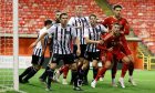 Aberdeen and Fraserburgh players battle for possession in the Aberdeenshire Shield at Pittodrie. Image: Shutterstock.