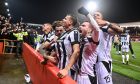 The PAOK players celebrate in front of their fans after scoring the winner against Aberdeen in the Europa Conference League two weeks ago. Image: Shutterstock.