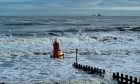 The fairway buoy has washed up on Aberdeen beach. Image: Port of Aberdeen/LinkedIn.