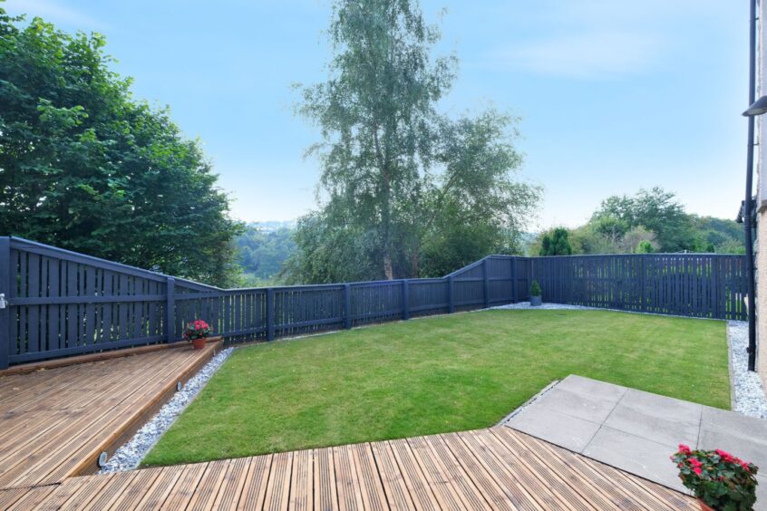 Large, fully enclosed back garden at the house for sale in Inverurie.