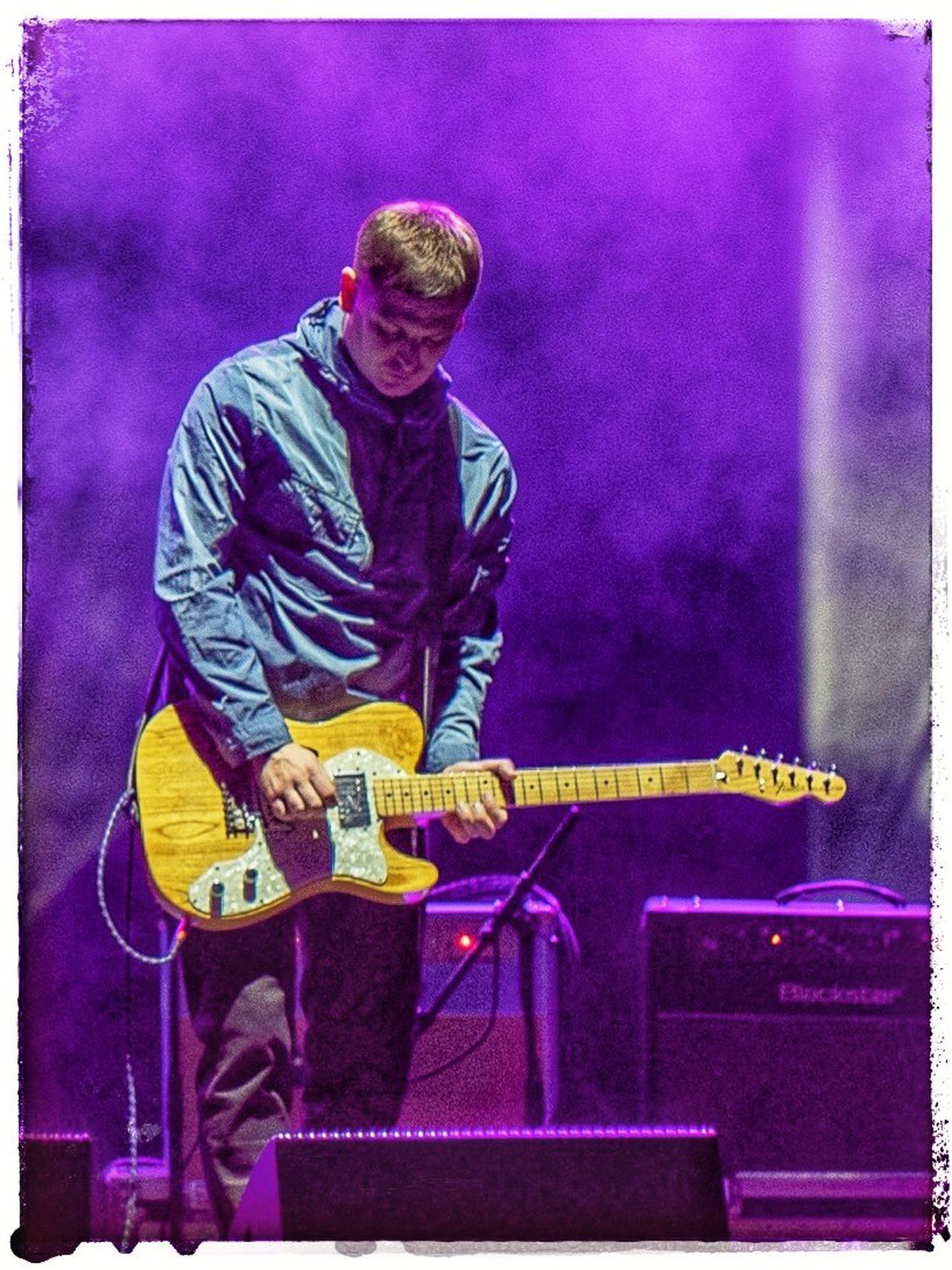 Skylights guitarist on stage.