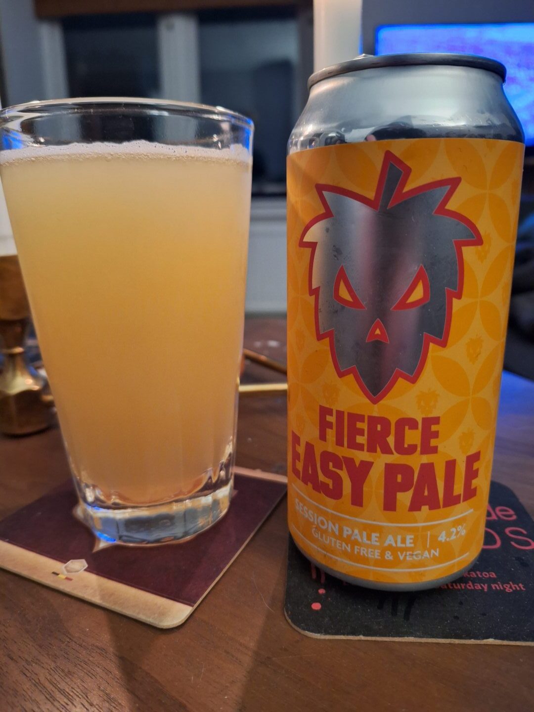 A can of Fierce's Easy Pale poured into a glass