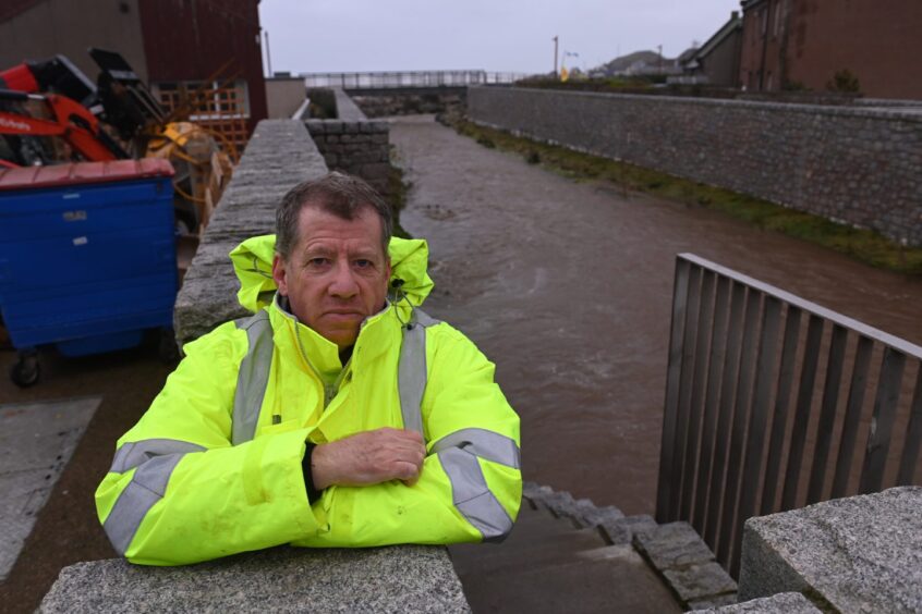 Richard Porter of construction firm McLaughlin and Harvey next to Stonehaven flood defence scheme.