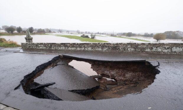 A huge hole in Bridge of Dun after Storm Babet. Image: Paul Reid